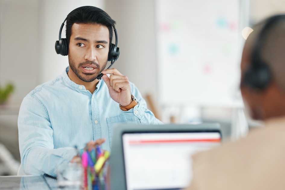 "Illustration of a business tech support team managing IT systems, cybersecurity, and software tools for a modern office in 2025."
